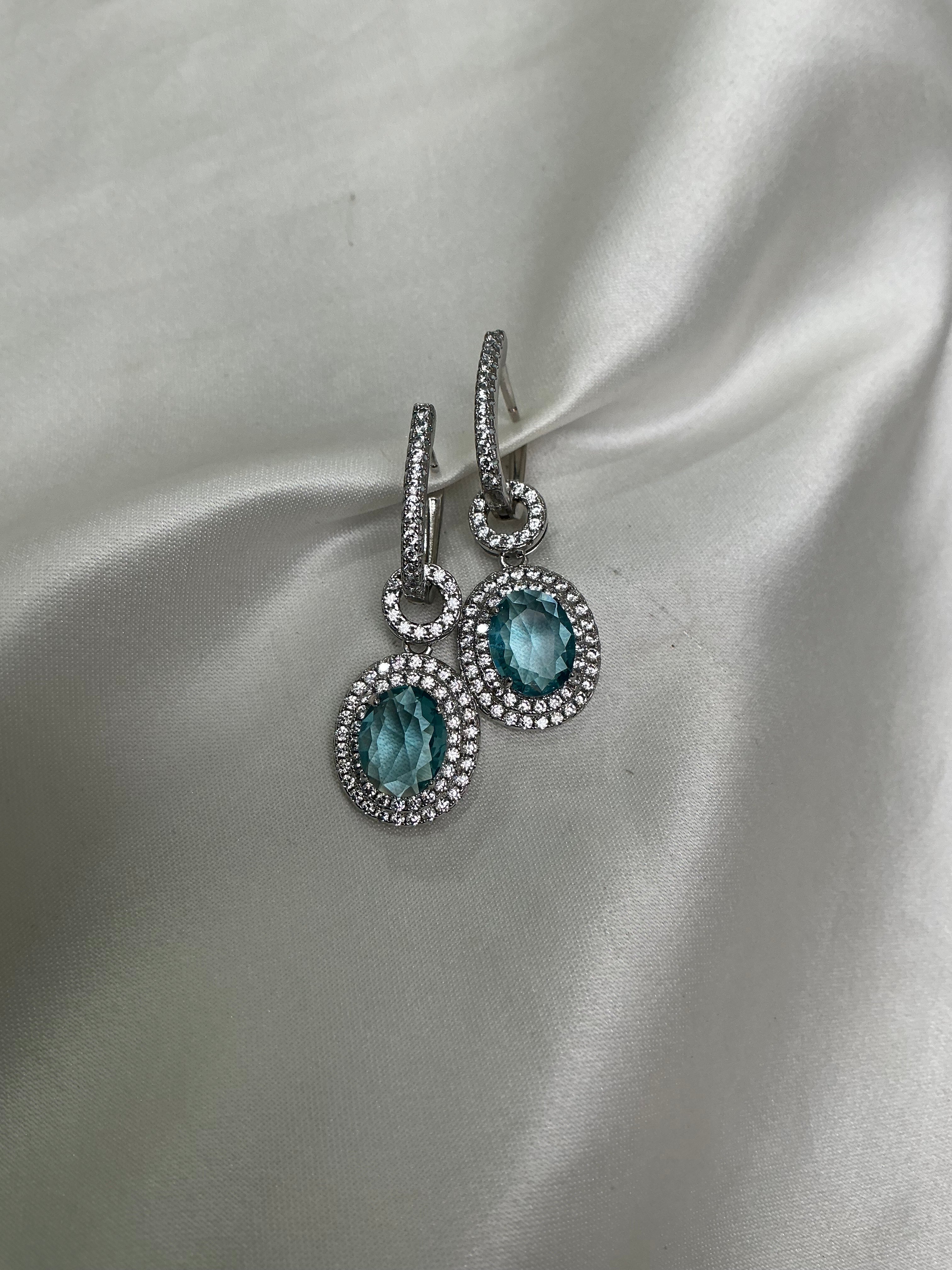 Aretes Merche